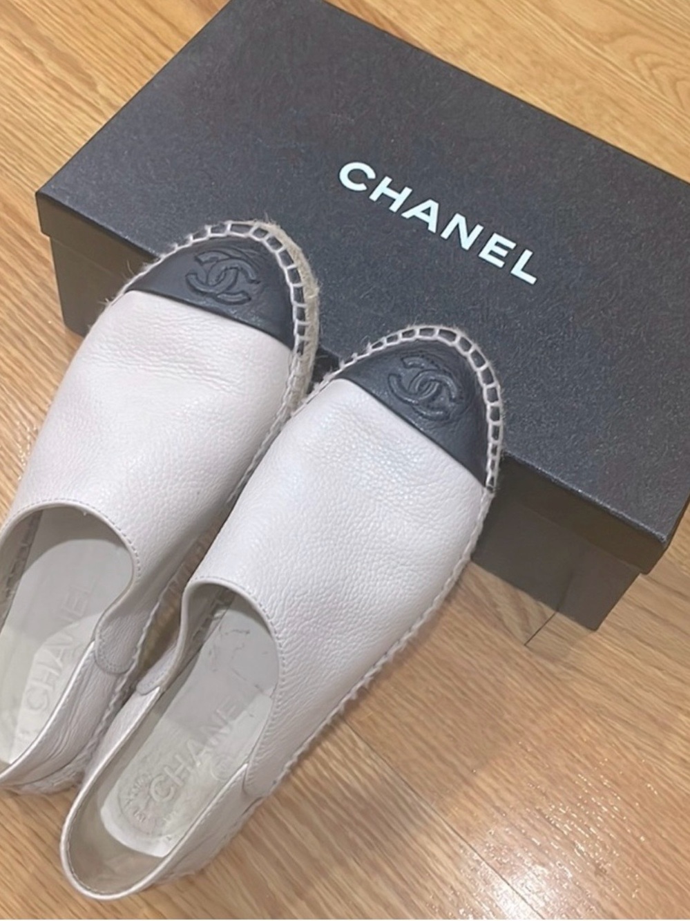 CHANEL White Leather Espadrille Slip-On with Black Cap Toe